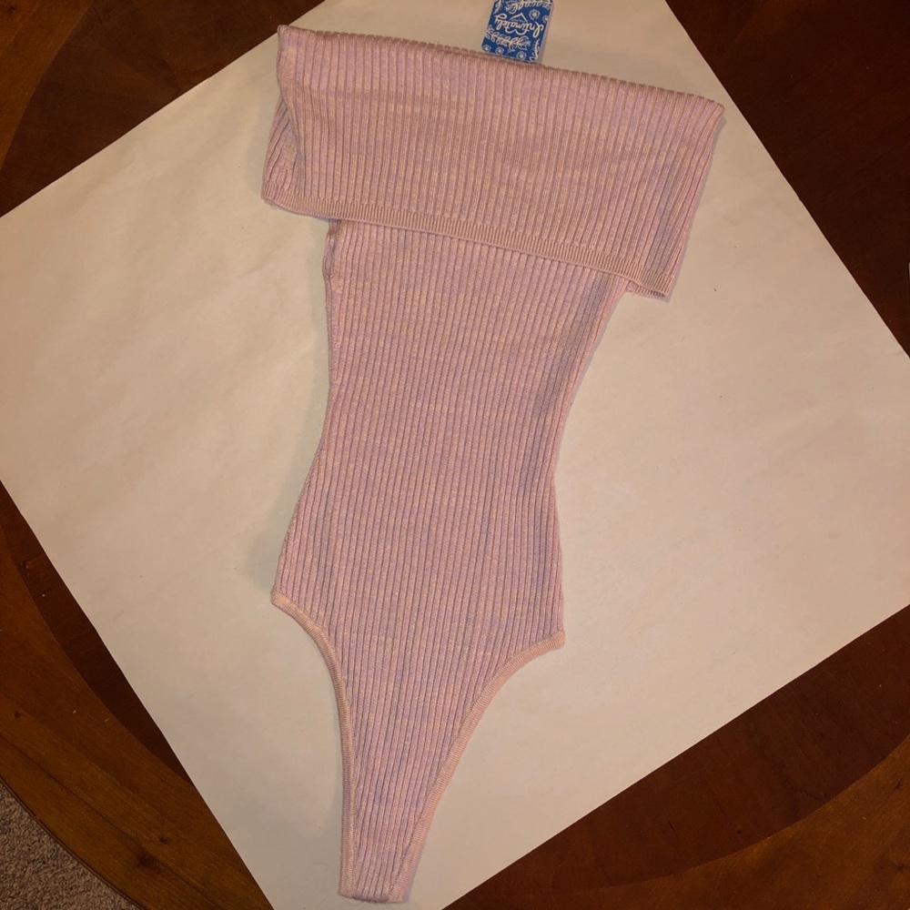 Free People NWT bodysuit. XS light pink